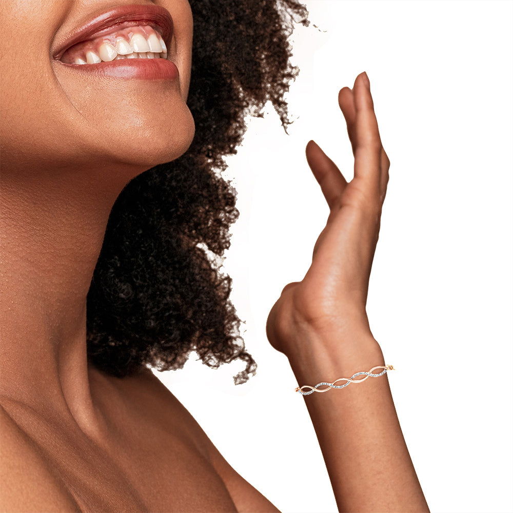 .925 Sterling Silver Diamond Infinity Twist 4â€-10†Adjustable Bolo Bracelet (I-J Color, I2-I3 Clarity)